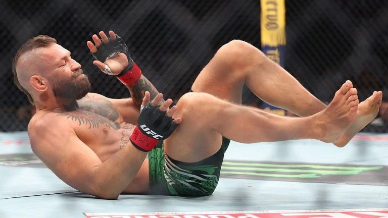 McGregor’s UFC Comeback Ends in 69 Seconds With Knee Injury